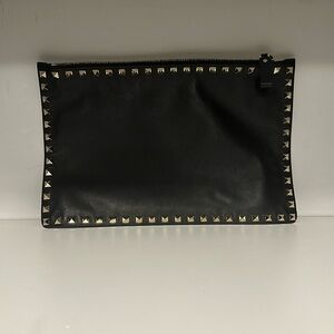 Valentino Rockstud Flat Zip clutch